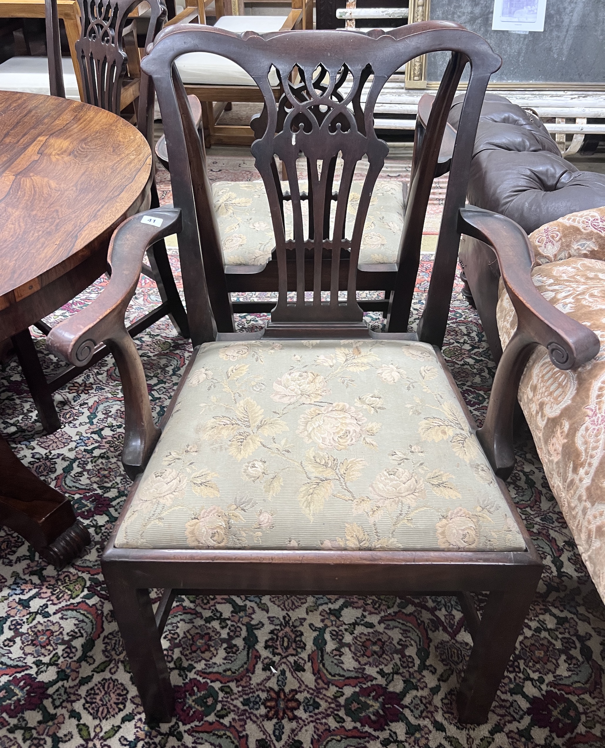 A set of six George III style mahogany dining chairs including two carvers